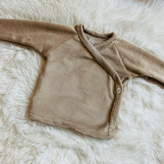 Soft sand-colored ribbed velvet