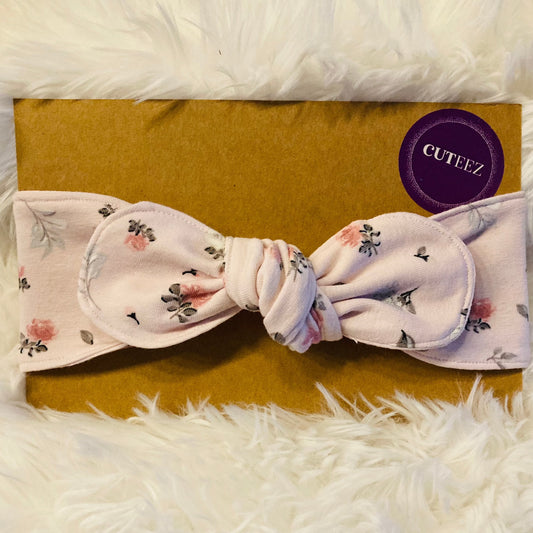 Gebloemde haarband baby peuter strik rond. Handgemaakte duurzame babykleding webshop Cuteez.