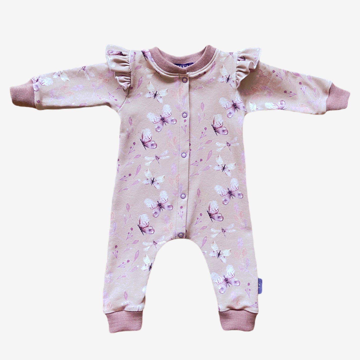 Volledig uitgestald boxpakje Vlinder met roze en paarse vlinderprint. Handgemaakt en duurzaam babypakje in maat 48-68 van webshop Cuteez.