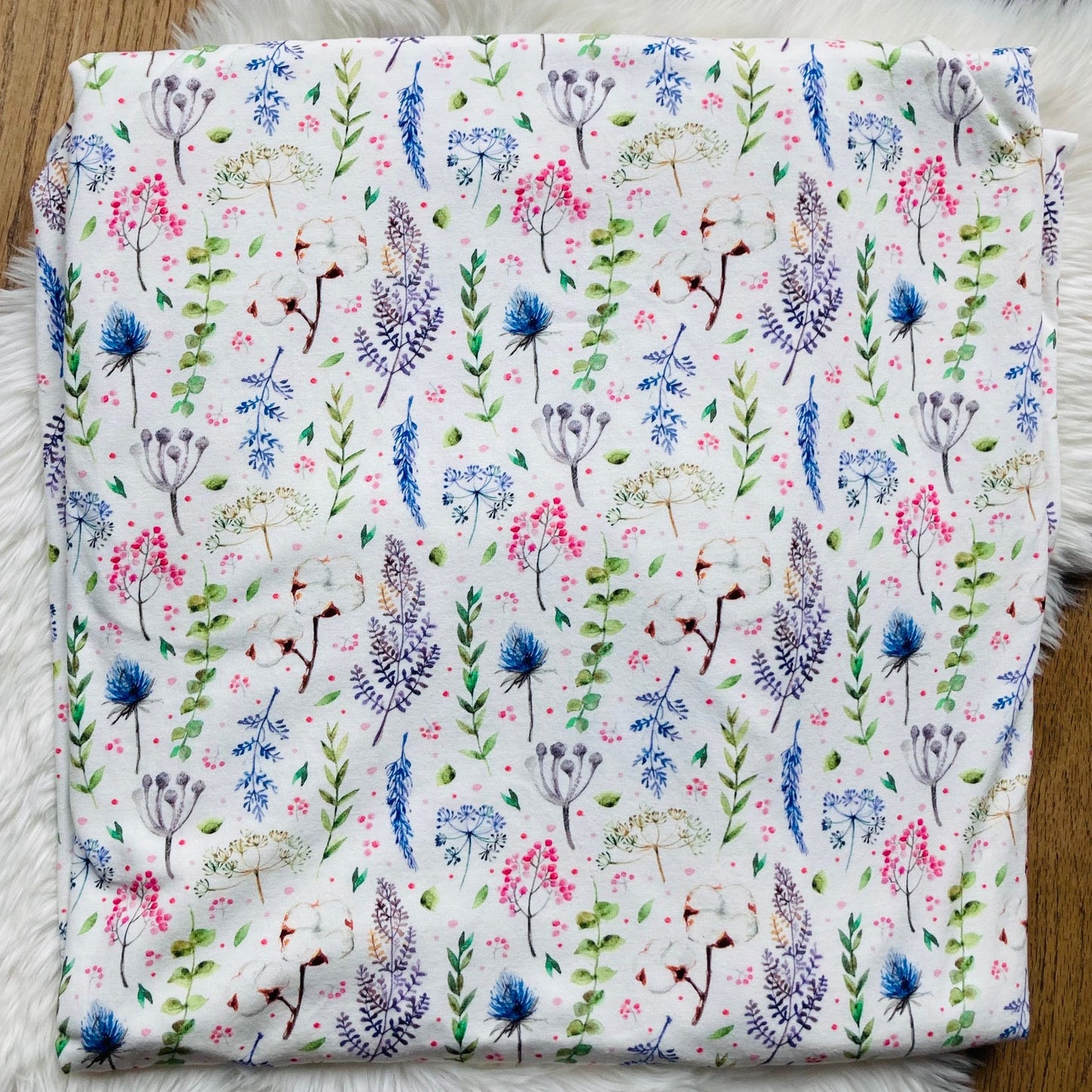 Tricot Wildflowers. Quality tricot with floral pattern for handmade baby and children's clothing.