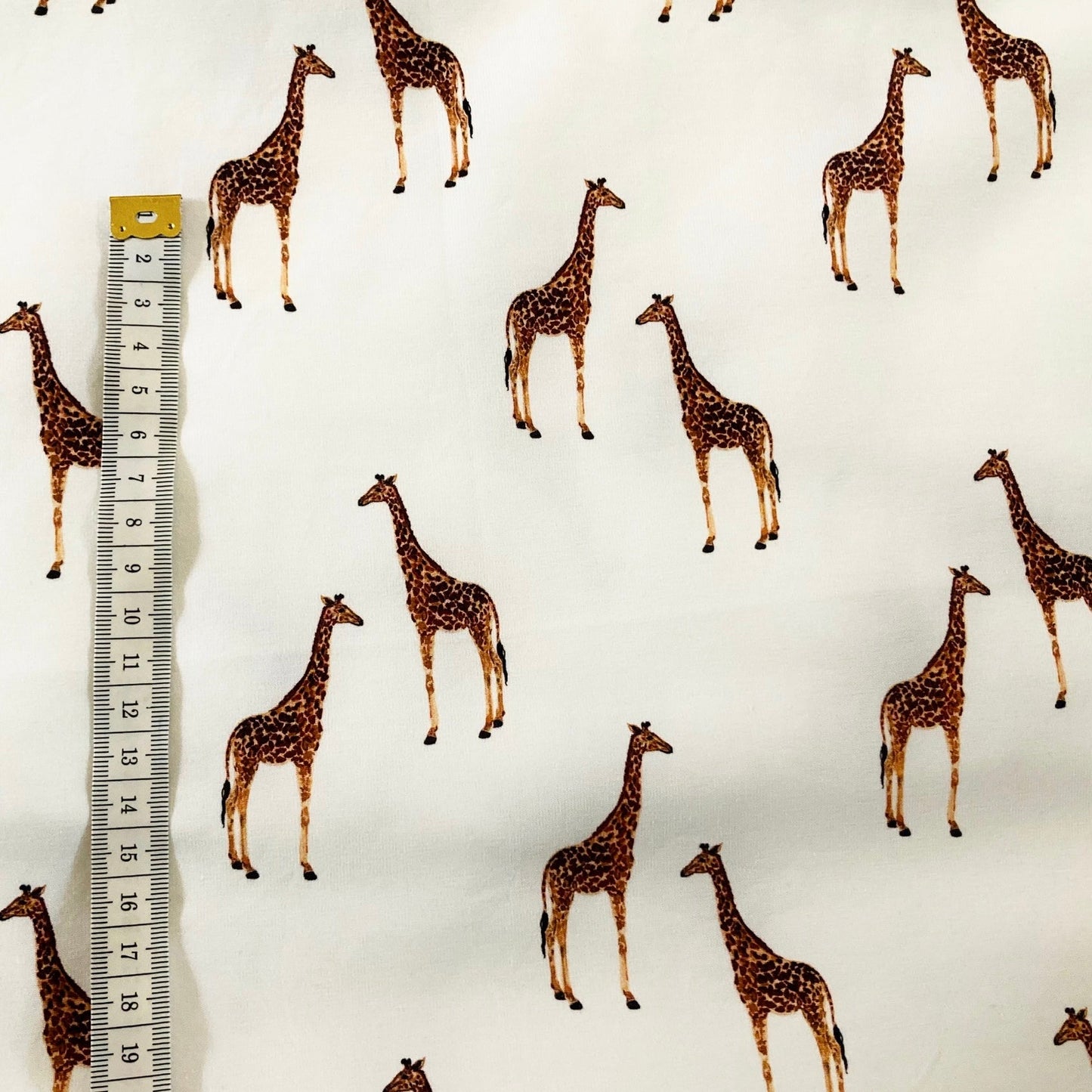 Jersey Giraffe. Tricot in off-white/brown tones for handmade baby and children's clothing.