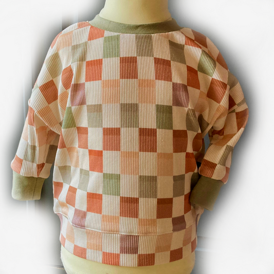 Handgemaakt geblokt ribstof babytruitje ‘Blocks’ van Cuteez – duurzaam en zacht katoen voor jongens